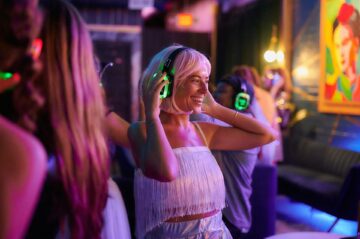 Girl enjoying silent disco party