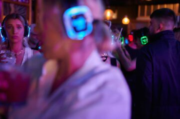 crowd of people at a silent disco party